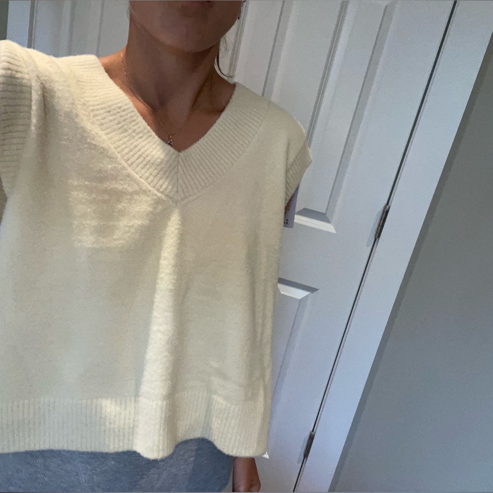 Never worn Abercrombie pale yellow shirt/vest. Size small.